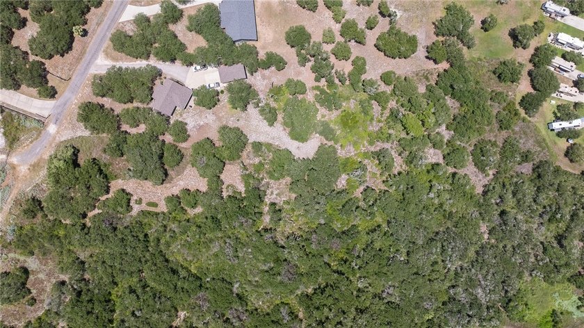 This lot has just under 2 acres of raw land that is located - photo 3