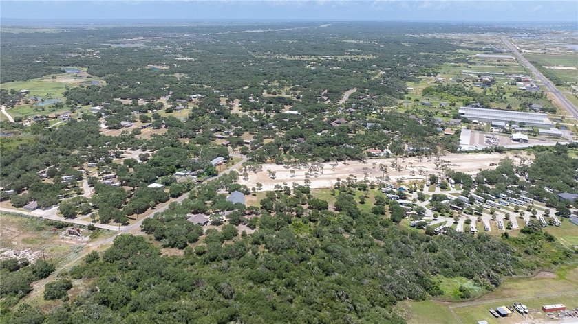 This lot has just under 2 acres of raw land that is located - photo 8
