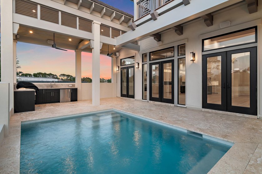 Less than a mile from the beach! Finishes and details are - photo 37