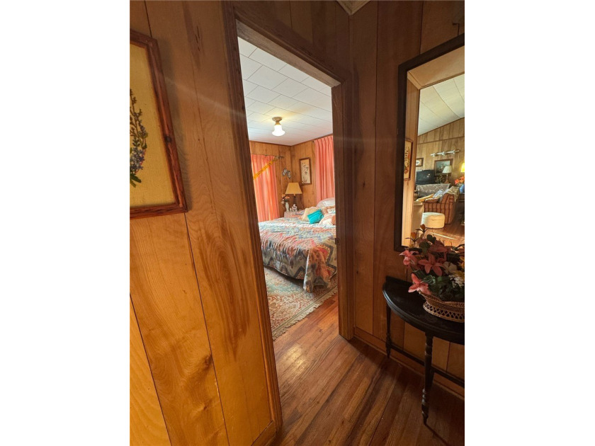This Legacy Property Awaits Its Next Chapter. Nestled on an - photo 13