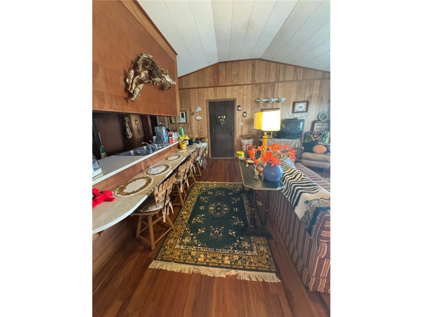This Legacy Property Awaits Its Next Chapter. Nestled on an - photo 16