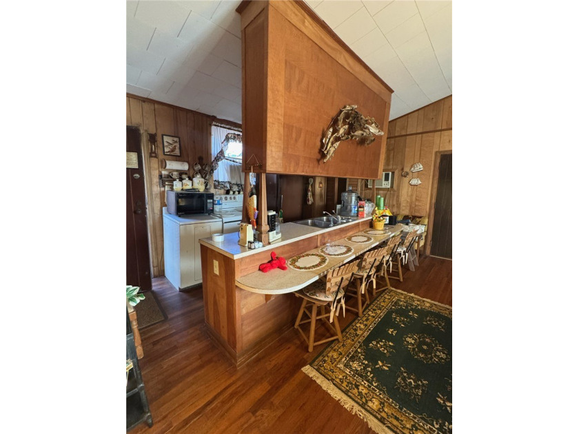 This Legacy Property Awaits Its Next Chapter. Nestled on an - photo 17