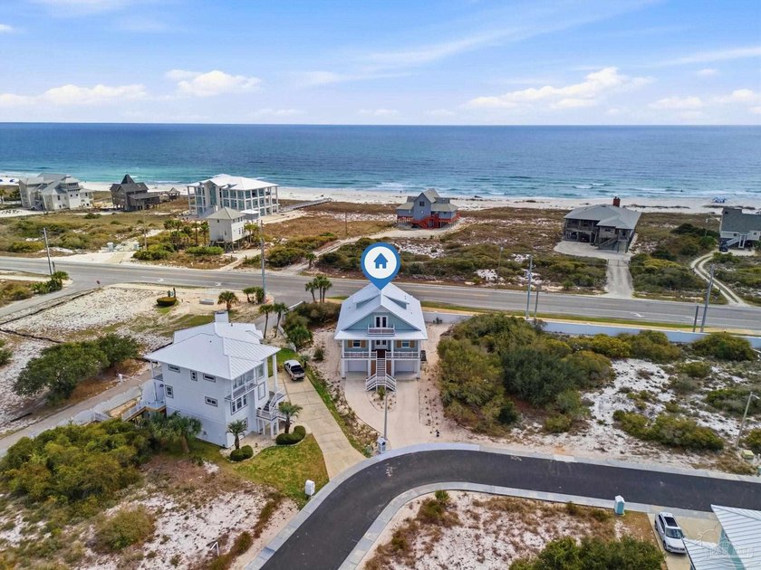 Experience elevated coastal living at 425 Gulfview Ln., a newly - photo 2