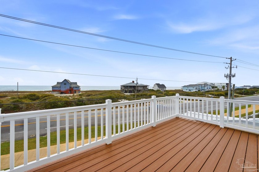 Experience elevated coastal living at 425 Gulfview Ln., a newly - photo 3