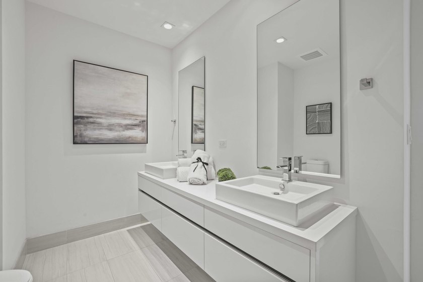 Perched high above the heart of Downtown Boca Raton, this - photo 14