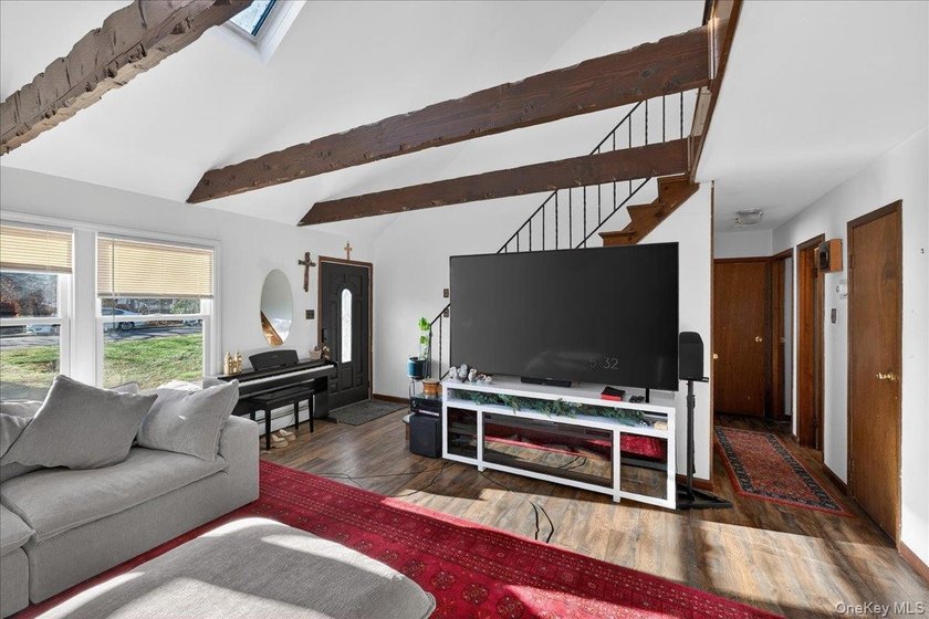 Welcome to this spacious and versatile home set on an oversized - photo 3