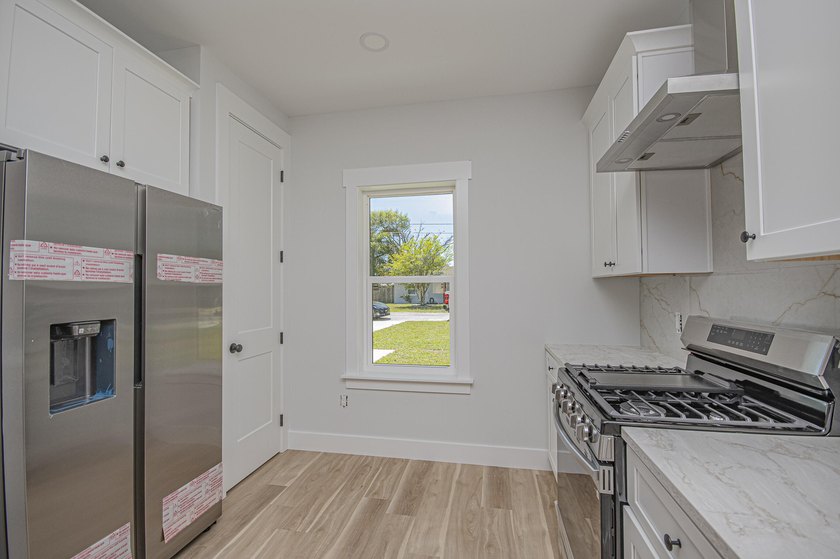 Step into this semi-custom home beautifully designed with plenty - photo 14