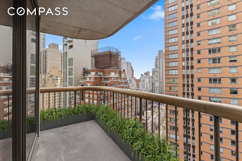 Welcome to 167 E 61st St, a stunning oversized 2-bedroom, 2 - photo 3