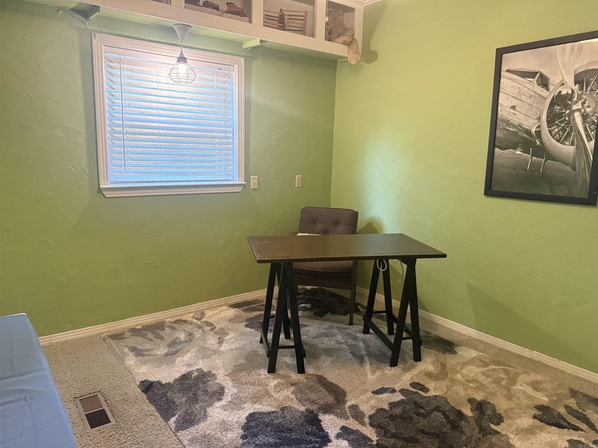 Welcome home to this charming 4-bedroom, 2-bath home nestled in - photo 11