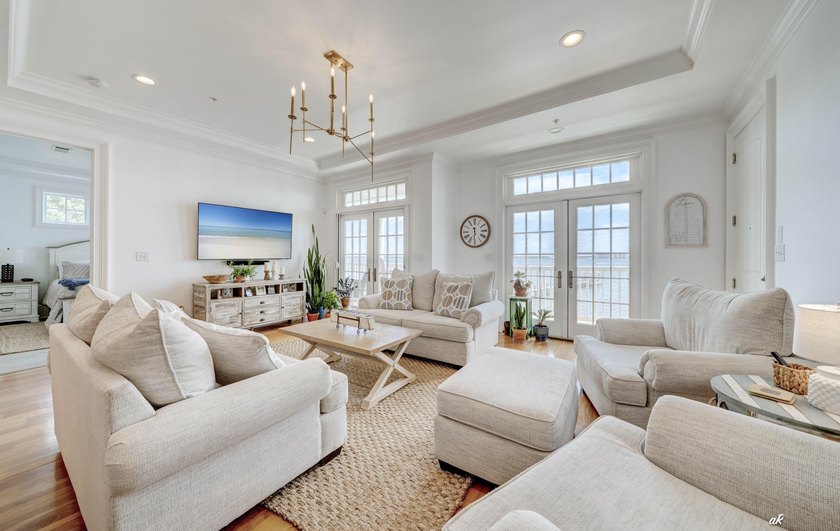 This extraordinary waterfront end unit condo, nestled in the - photo 14