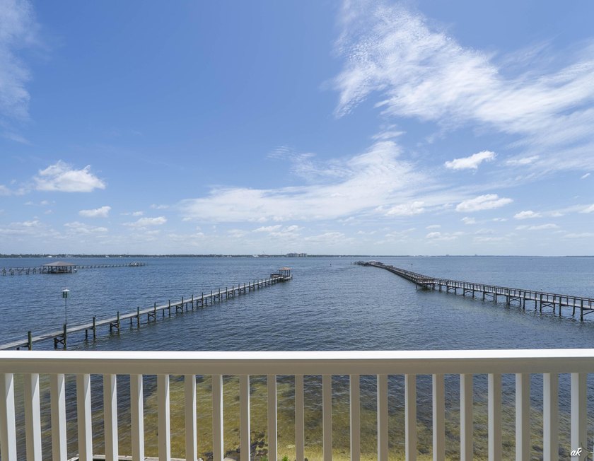 This extraordinary waterfront end unit condo, nestled in the - photo 16