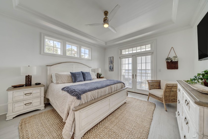 This extraordinary waterfront end unit condo, nestled in the - photo 18