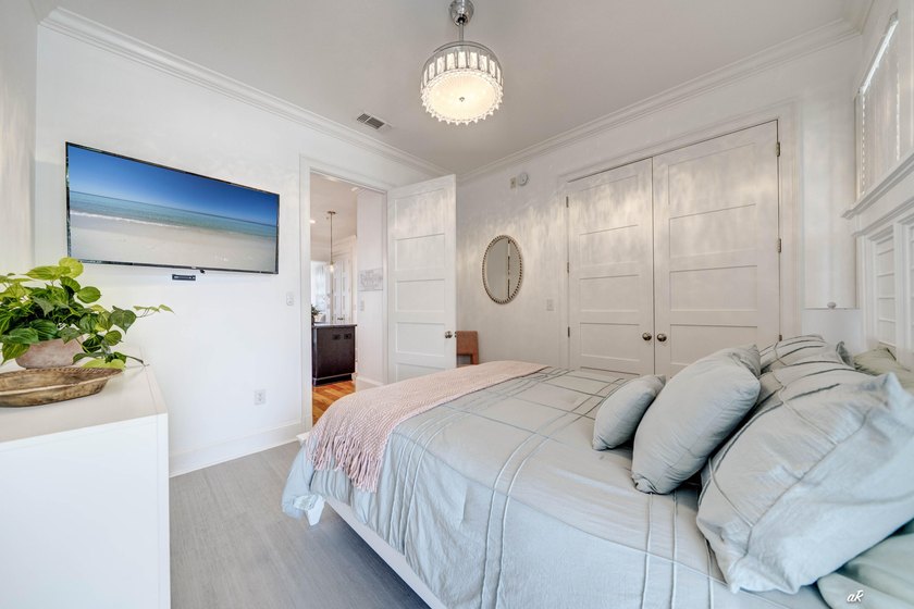 This extraordinary waterfront end unit condo, nestled in the - photo 30