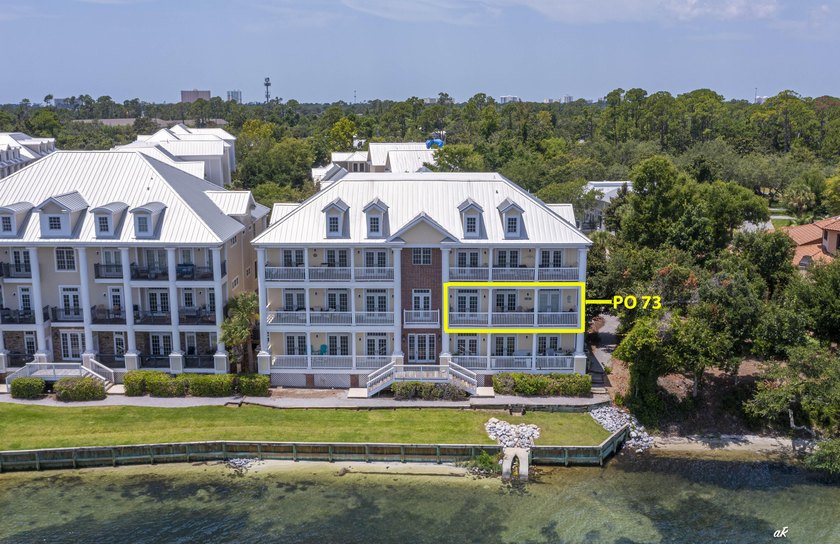 This extraordinary waterfront end unit condo, nestled in the - photo 32