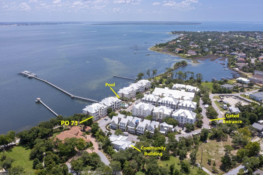 This extraordinary waterfront end unit condo, nestled in the - photo 33