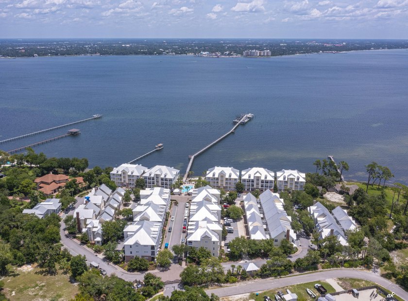 This extraordinary waterfront end unit condo, nestled in the - photo 34