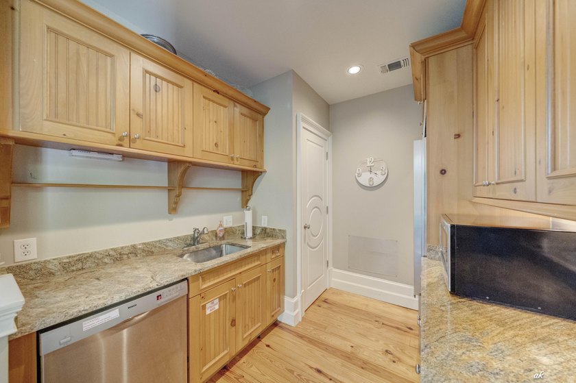 This extraordinary waterfront end unit condo, nestled in the - photo 45