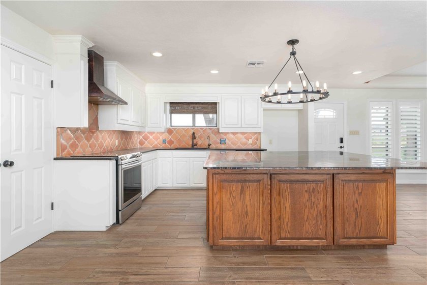 Discover one of the most sought-after homes in town-a spacious - photo 8