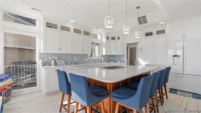 Experience the ultimate Lake of the Ozarks lifestyle in this - photo 21