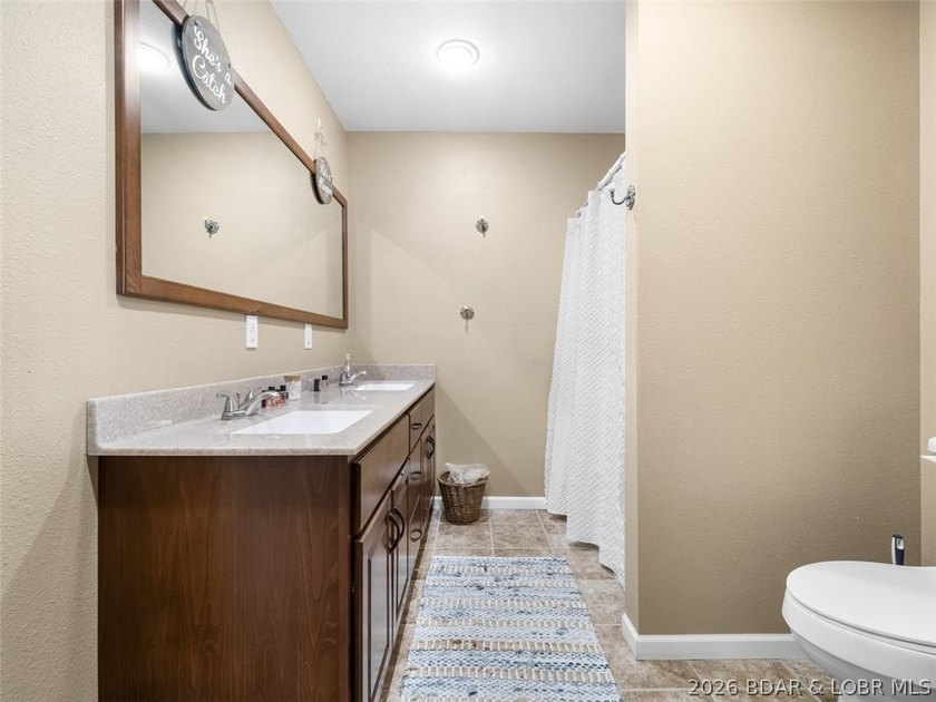 This spectacular home sitting at the one mile marker is one of - photo 20