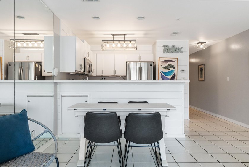 Enjoy coastal charm in this beautifully decorated 1 bed, 1.5 - photo 3