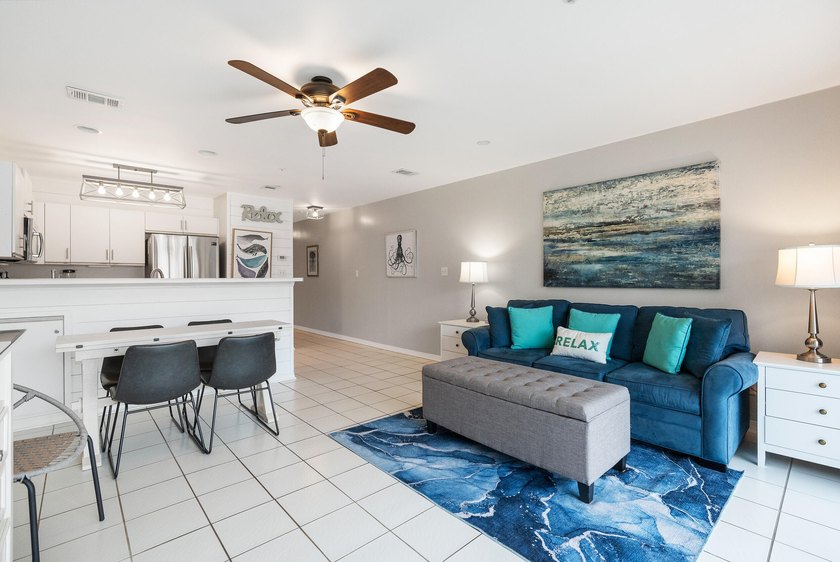 Enjoy coastal charm in this beautifully decorated 1 bed, 1.5 - photo 4
