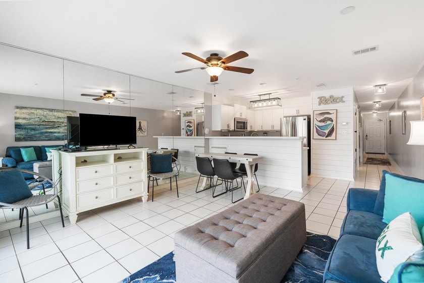 Enjoy coastal charm in this beautifully decorated 1 bed, 1.5 - photo 8