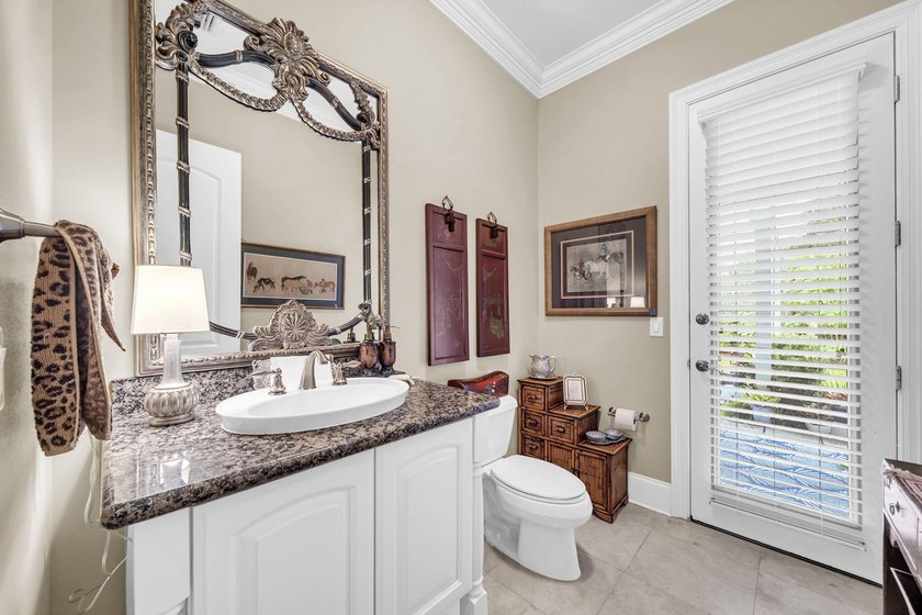 Welcome to an exceptional lakefront residence in the prestigious - photo 22