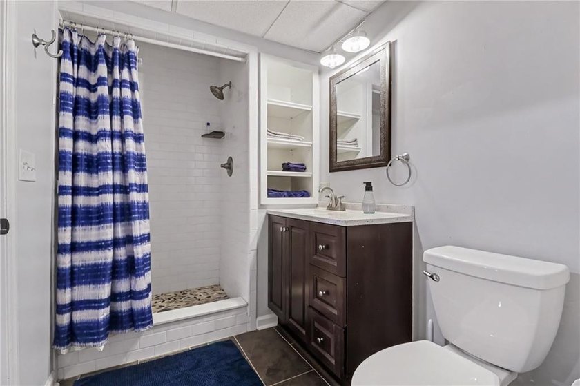 Nestled in a private, picturesque setting, this exceptional - photo 22