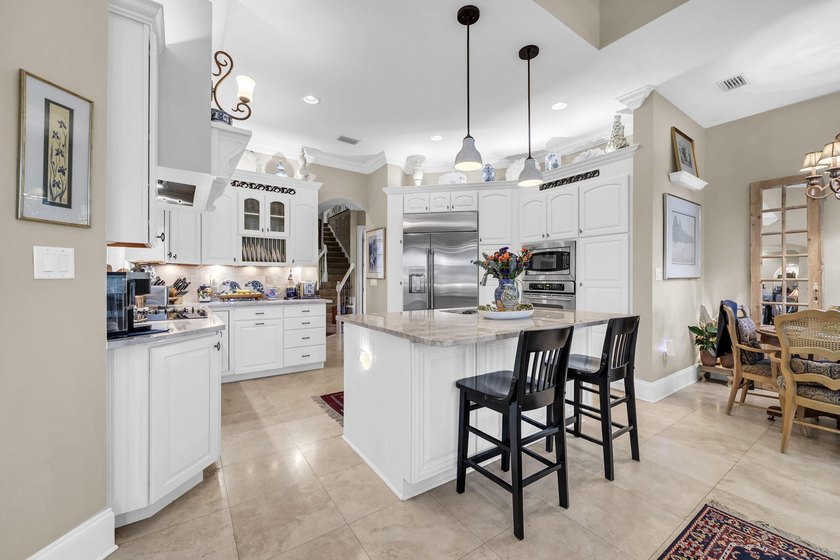 Welcome to an exceptional lakefront residence in the prestigious - photo 23