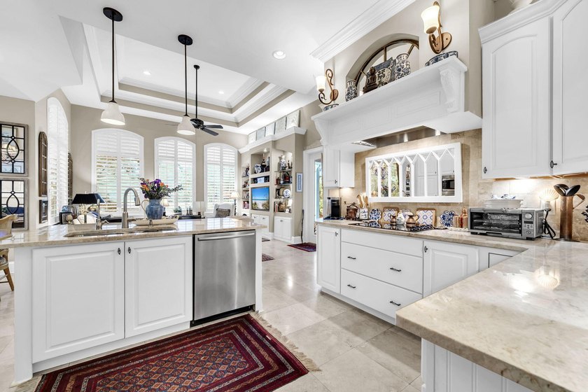 Welcome to an exceptional lakefront residence in the prestigious - photo 26