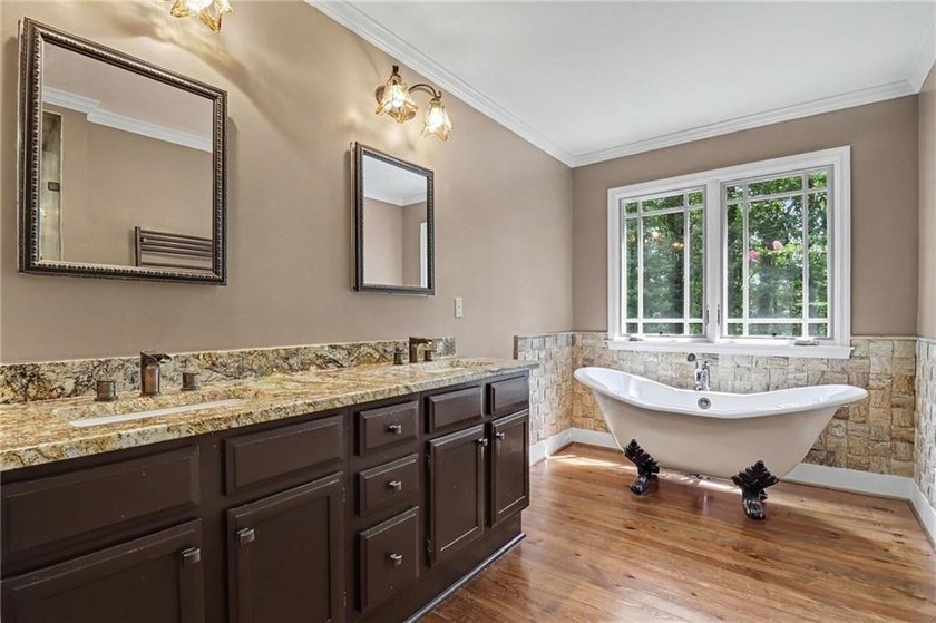 Nestled in a private, picturesque setting, this exceptional - photo 31