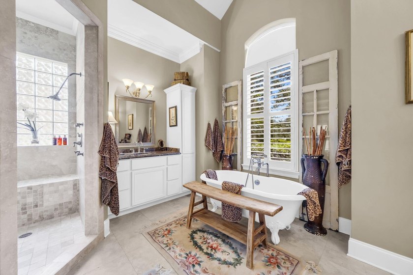 Welcome to an exceptional lakefront residence in the prestigious - photo 35