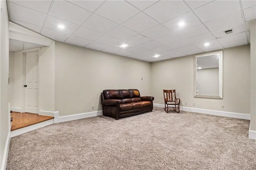 Nestled in a private, picturesque setting, this exceptional - photo 38
