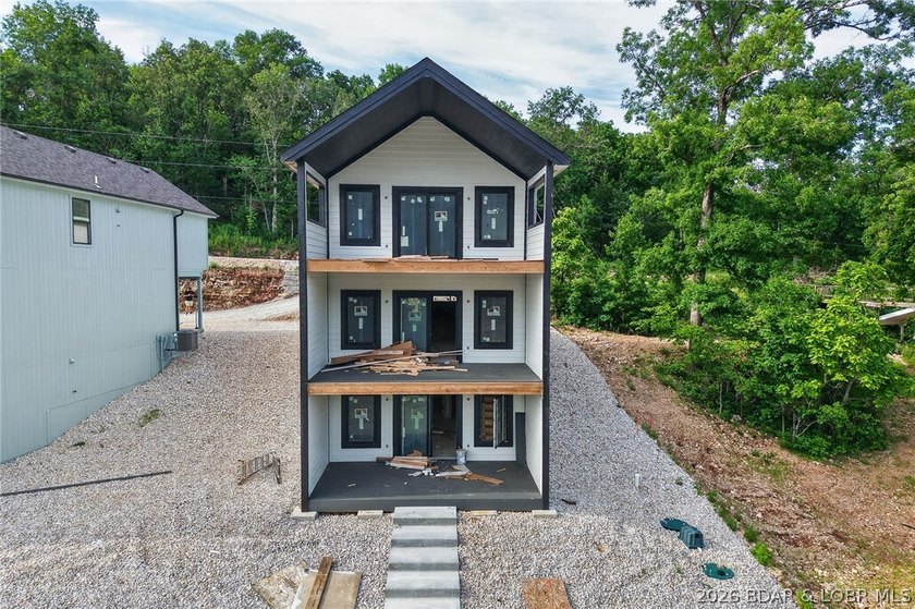 BRAND NEW LAKE HOME AND DOCK!!! The perfect blend of modern - photo 40