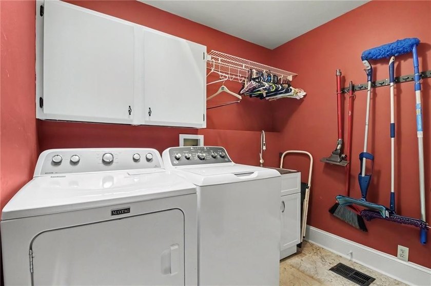 Nestled in a private, picturesque setting, this exceptional - photo 41