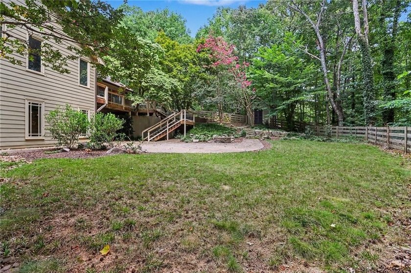 Nestled in a private, picturesque setting, this exceptional - photo 45