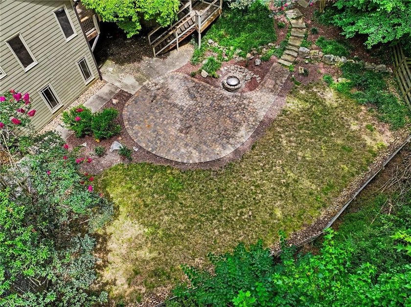 Nestled in a private, picturesque setting, this exceptional - photo 50