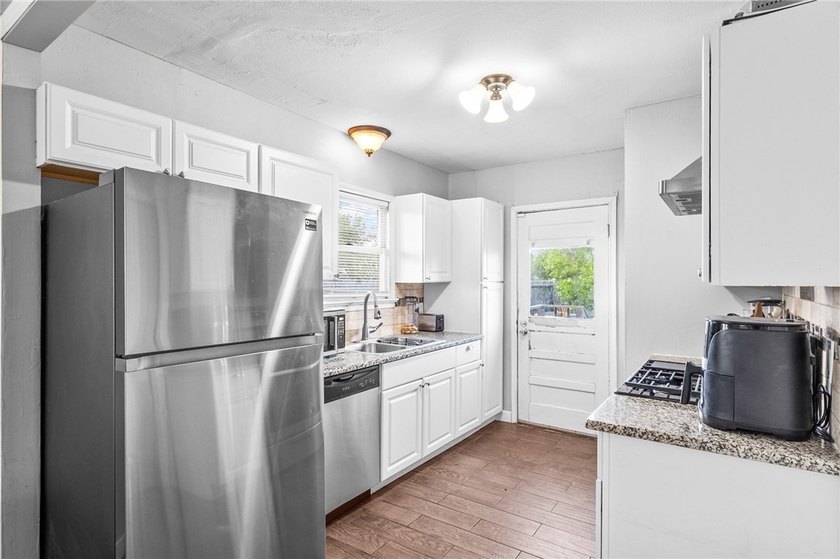 Timeless Charm Meets Modern Comfort in Alameda Estates Welcome - photo 3