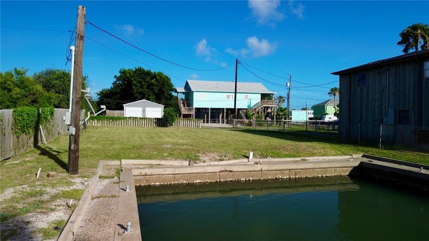 Build your dream coastal home on the beautiful canal-front lot - photo 3