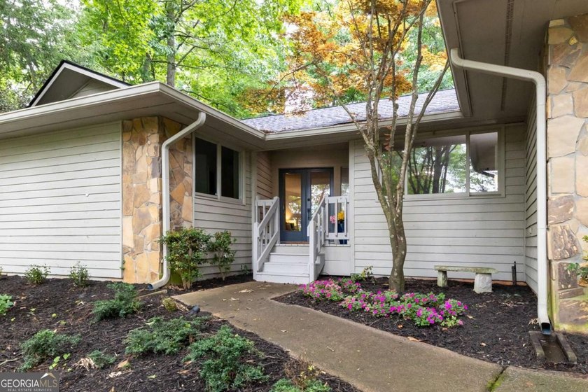 Move-in ready and beautifully updated, this modern ranch offers - photo 2
