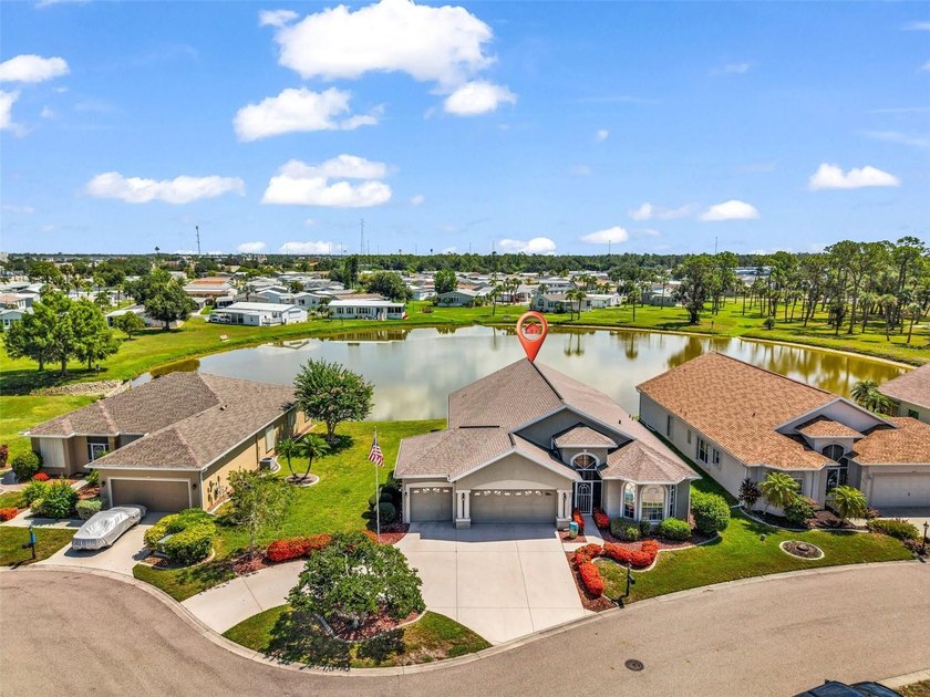 RARELY AVAILABLE FULL 3-CAR GARAGE with a circular driveway with - photo 22