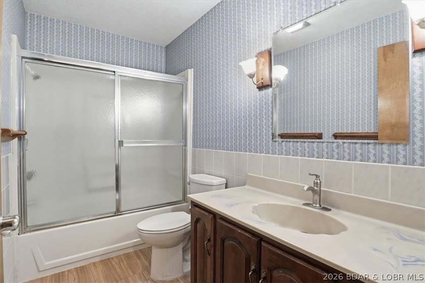 Discover the perfect blend of privacy, space, and lake living on - photo 25