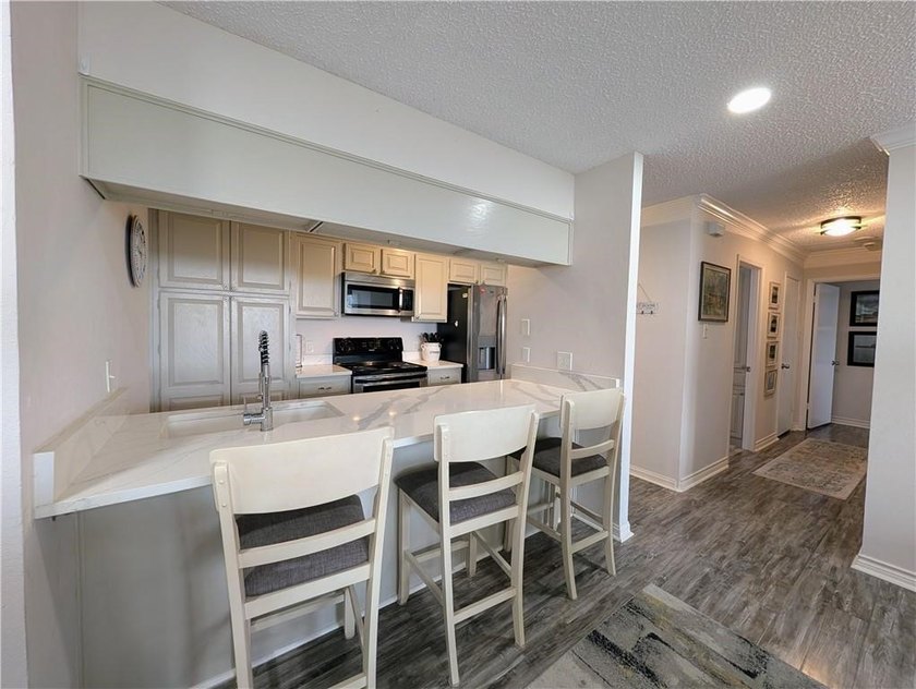 Discover waterfront living at Marina del Sol with Unit 1002C at - photo 10