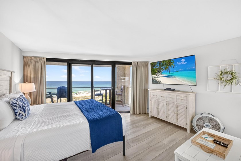Wake up to sweeping Gulf and resort views from this beautifully - photo 12