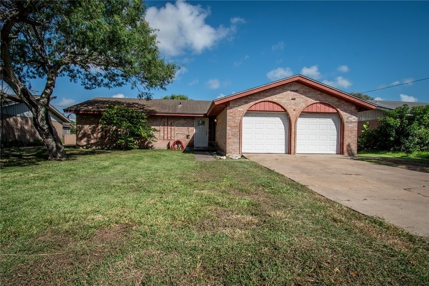 Welcome to this charming 3-bedroom, 2-bath home in the highly - photo 2
