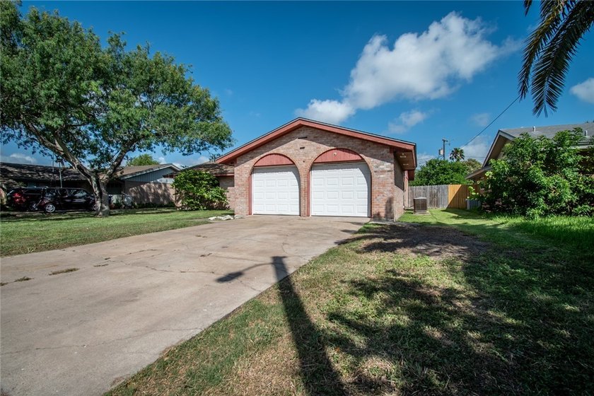 Welcome to this charming 3-bedroom, 2-bath home in the highly - photo 3