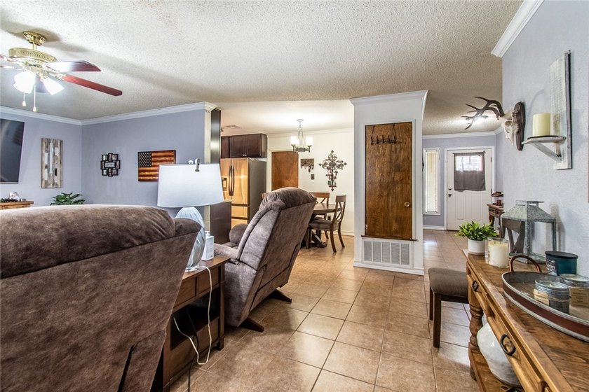 Welcome to this charming 3-bedroom, 2-bath home in the highly - photo 6