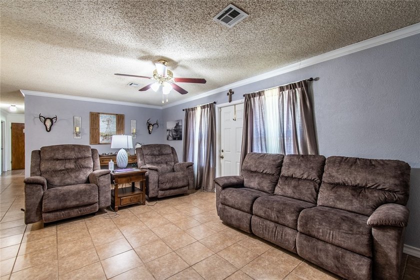 Welcome to this charming 3-bedroom, 2-bath home in the highly - photo 8