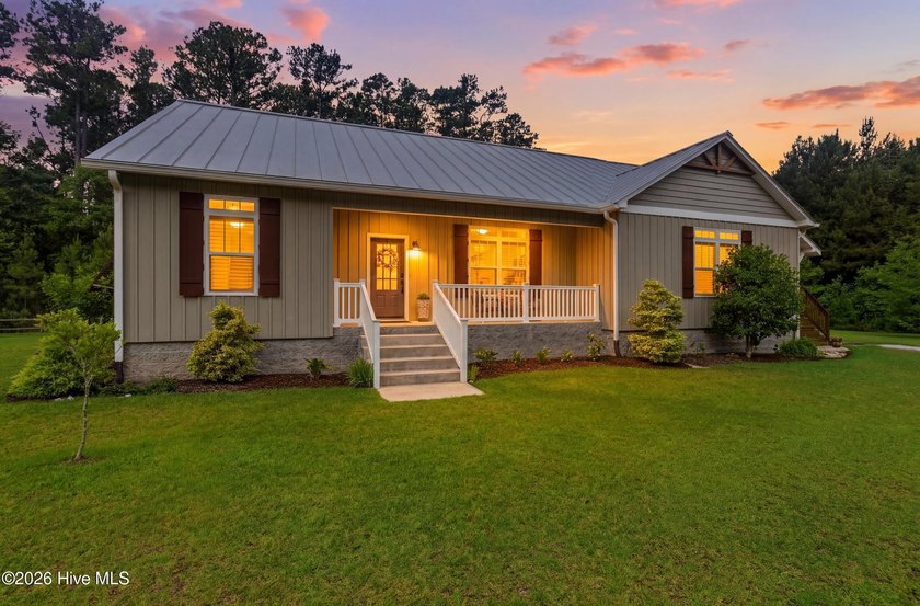 Custom-built and thoughtfully designed, this beautiful home - photo 2
